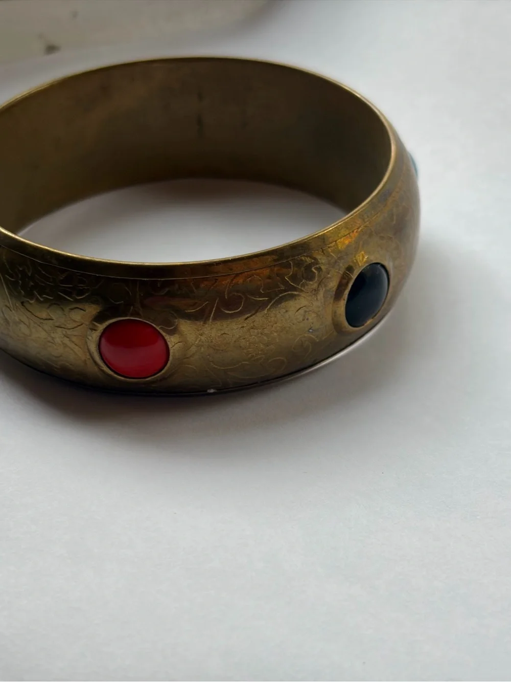 Vintage-Inspired Brass Bangle with Red, black, and Turquoise Cabochons